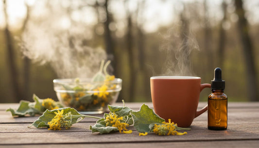 Rustic wooden table with dried mullein leaves and yellow flowers, a steaming cup of herbal tea, an amber tincture bottle with dropper, and a soft-focus steaming bowl and natural outdoor background conveying seasonal lung support and respiratory relief.