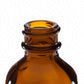 2oz amber tinted glass bottle neck close-up complete glass bottle assembly