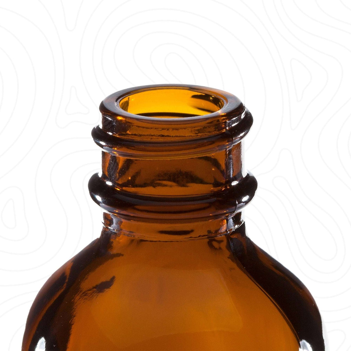 2oz amber tinted glass bottle neck close-up complete glass bottle assembly